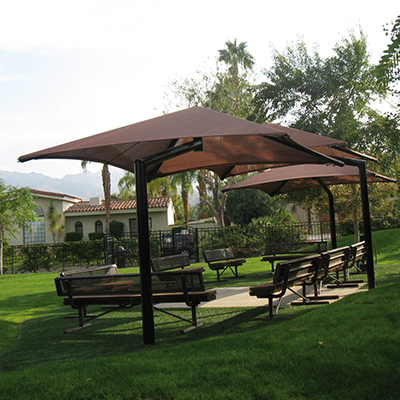 Shade structures like canopies, in public environments, providing shade and UV protection.